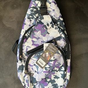 Anti theft daypack/sling bag.